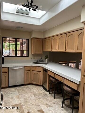 kitchen with light countertops and dishwasher