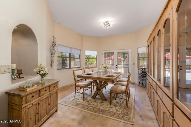 dining area with light wood finished floors