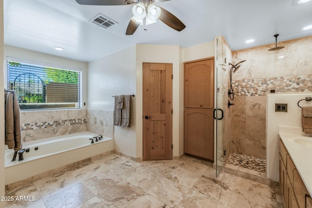 full bathroom with ceiling fan, a bath, visible vents, a shower stall, and vanity