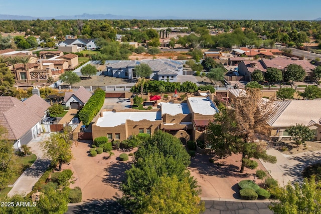 birds eye view of property with a residential view
