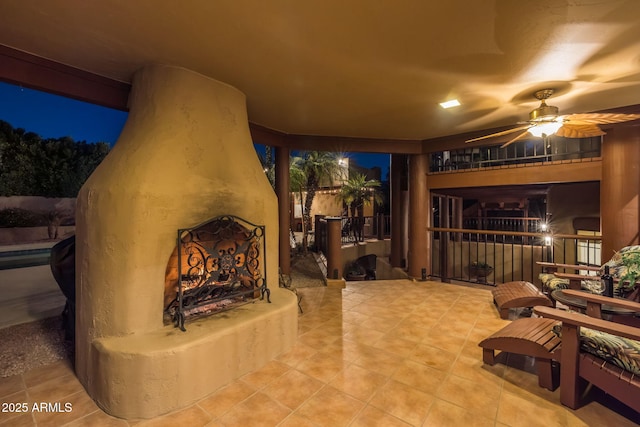 view of patio featuring a fireplace