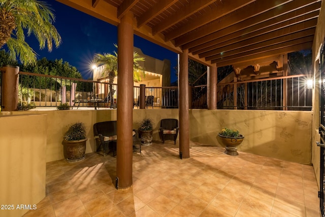 patio at night with fence