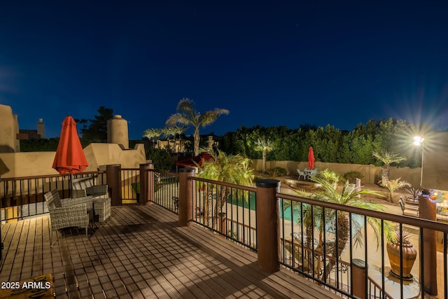 view of deck at night
