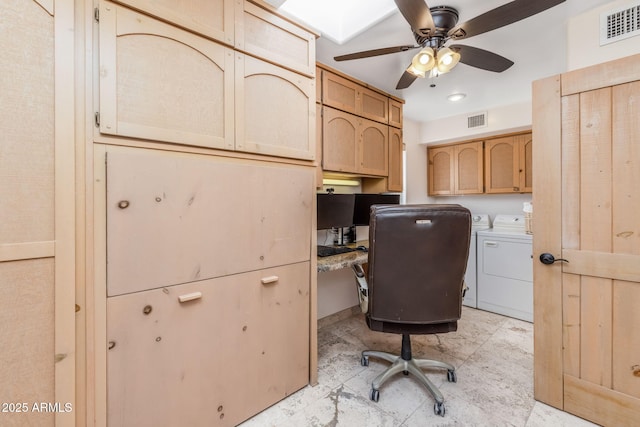 home office with visible vents, a ceiling fan, built in study area, and washing machine and clothes dryer