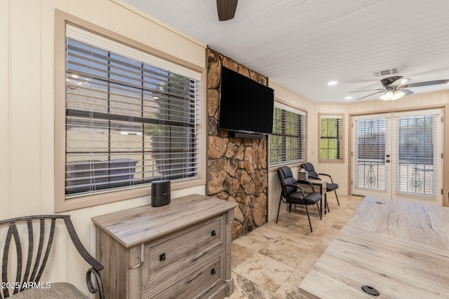 interior space with french doors and visible vents