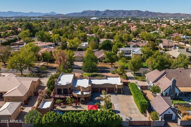 bird's eye view featuring a residential view and a mountain view