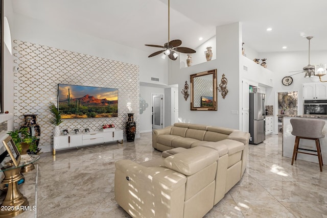 6941 W Voltaire Ave, Peoria, AZ 85381 - living room with a ceiling fan, high vaulted ceiling, light marble finish flooring, and recessed lighting