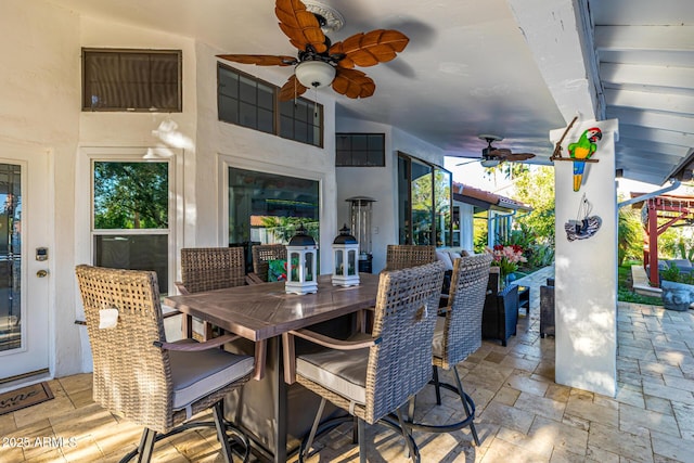 6941 W Voltaire Ave, Peoria, AZ 85381 - view of patio / terrace with a ceiling fan and outdoor dining space