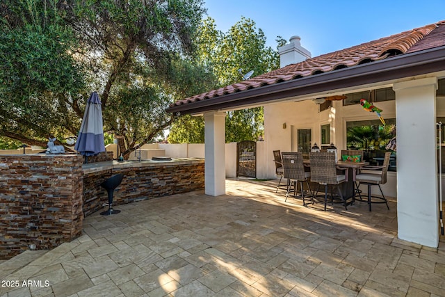 6941 W Voltaire Ave, Peoria, AZ 85381 - view of patio featuring fence and ceiling fan