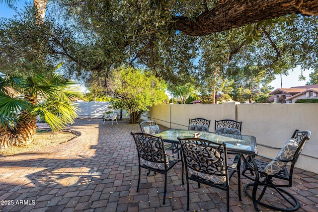 6941 W Voltaire Ave, Peoria, AZ 85381 - view of patio / terrace with a fenced backyard and outdoor dining area