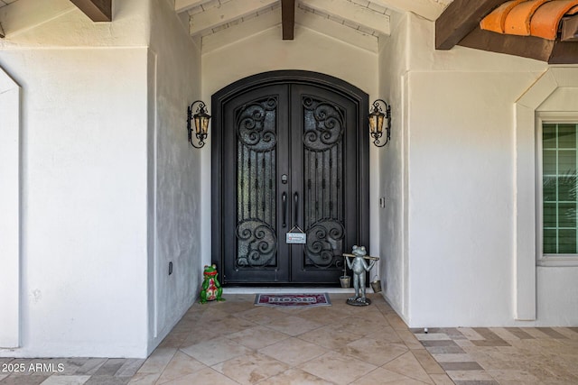 6941 W Voltaire Ave, Peoria, AZ 85381 - property entrance featuring french doors and stucco siding