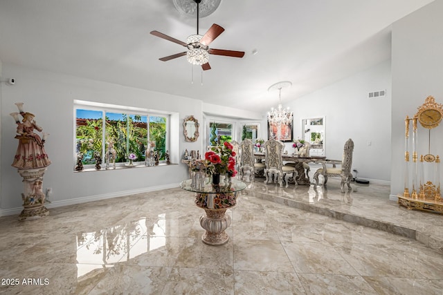 6941 W Voltaire Ave, Peoria, AZ 85381 - dining space featuring marble tiled flooring, vaulted ceiling, a ceiling fan, a chandelier, and baseboards