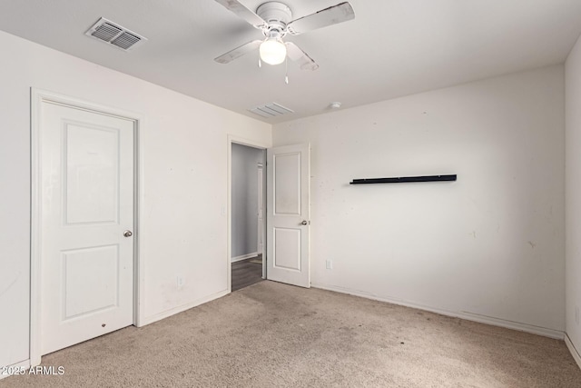 unfurnished bedroom with baseboards, visible vents, and carpet flooring