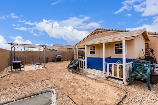 view of property exterior with a fenced backyard and a patio