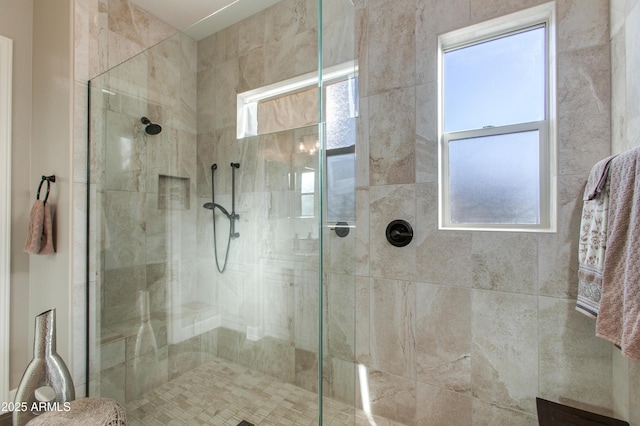 bathroom featuring tiled shower