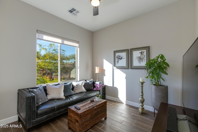 living room featuring ceiling fan