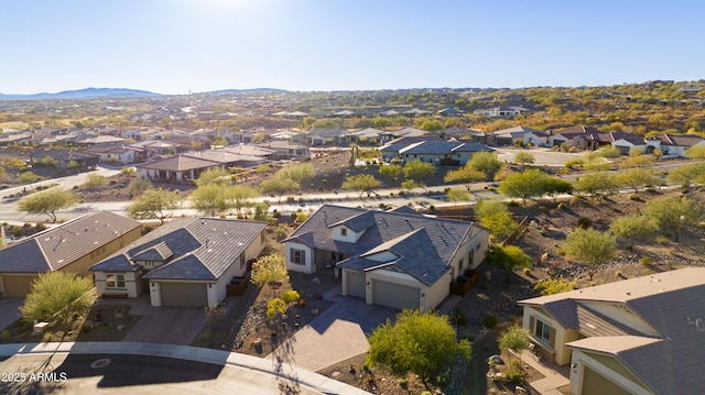 drone / aerial view featuring a mountain view