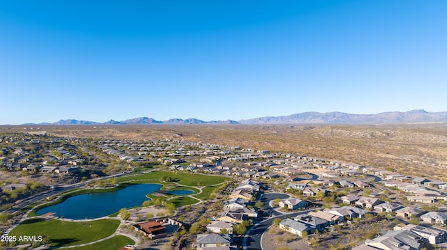 bird's eye view featuring a water and mountain view