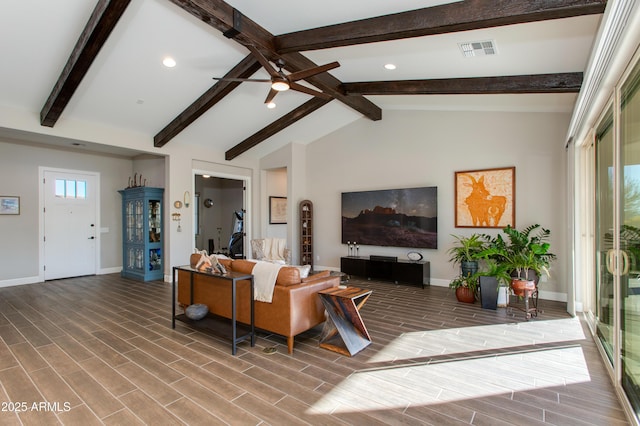 living room featuring vaulted ceiling with beams and ceiling fan