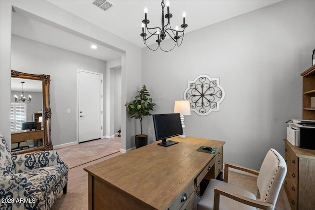 home office with a notable chandelier