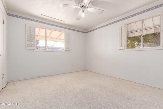 spare room with ceiling fan