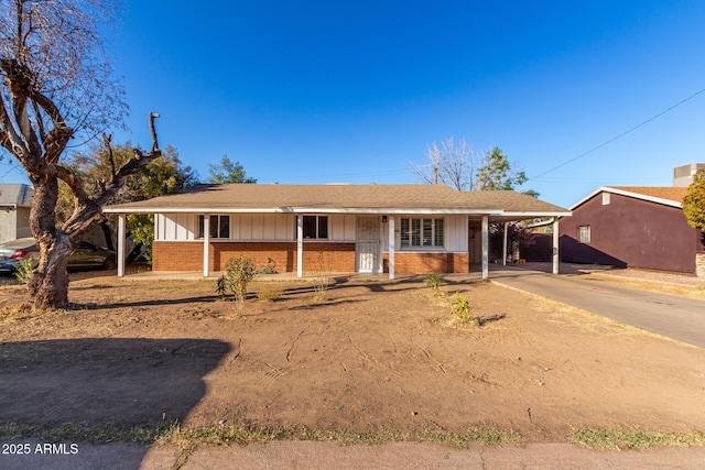 view of front of home featuring a carport