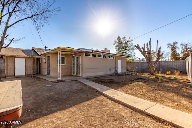 ranch-style house featuring a patio area