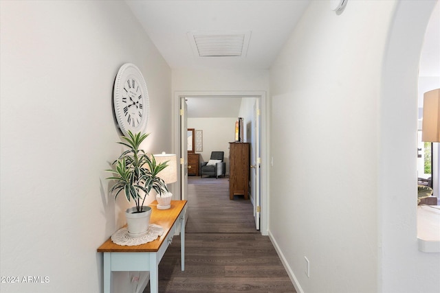 hallway featuring dark hardwood / wood-style flooring