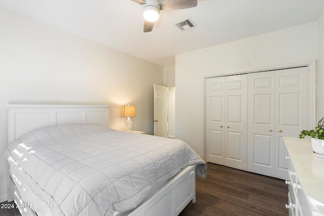 bedroom featuring a closet, ceiling fan, and dark hardwood / wood-style flooring