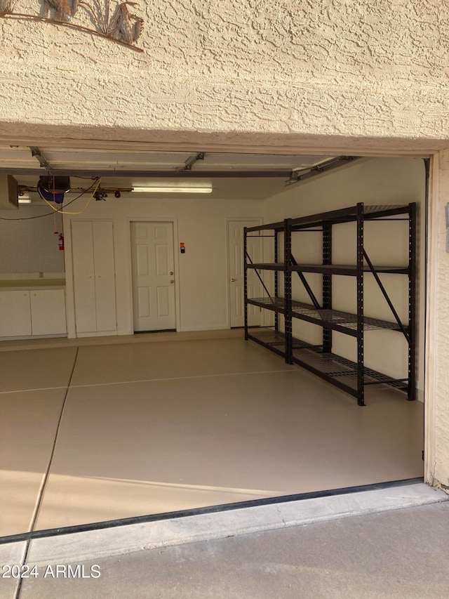 garage featuring a garage door opener