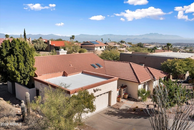 drone / aerial view featuring a mountain view