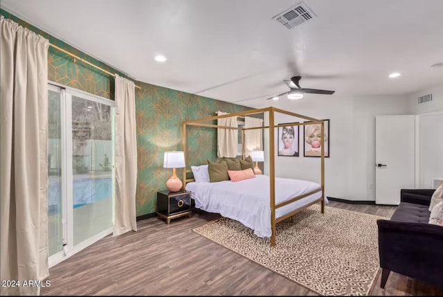 bedroom featuring hardwood / wood-style floors, access to exterior, and ceiling fan