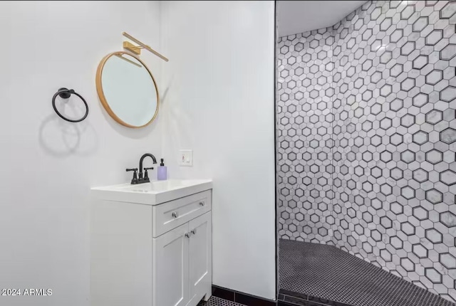 bathroom with vanity and a shower with shower curtain