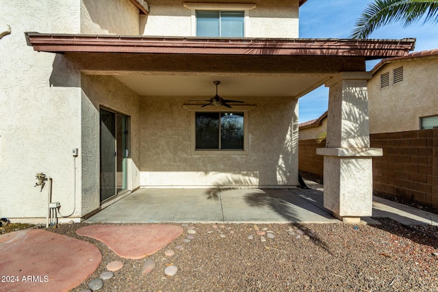 view of patio featuring ceiling fan