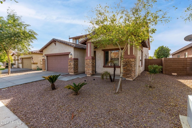 view of front of home with a garage