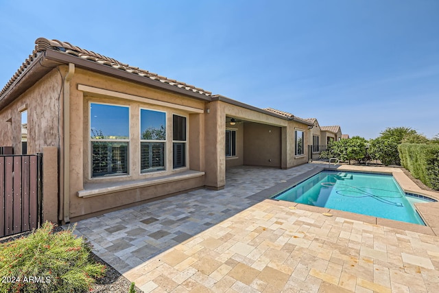 view of swimming pool featuring a patio