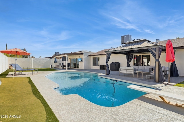 view of pool with a gazebo, a diving board, an outdoor hangout area, area for grilling, and a patio