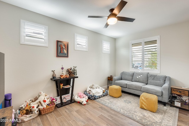 3699 E Sweetclover Ln, San Tan Valley, AZ 85140 - living room with ceiling fan and wood finished floors