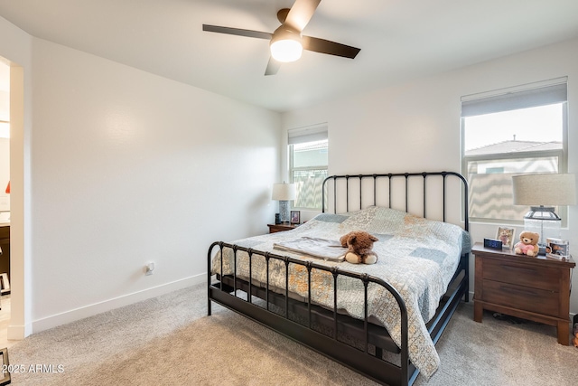 3699 E Sweetclover Ln, San Tan Valley, AZ 85140 - bedroom with light carpet, baseboards, and a ceiling fan