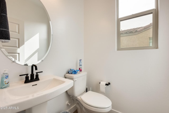 3699 E Sweetclover Ln, San Tan Valley, AZ 85140 - half bathroom with toilet and a sink