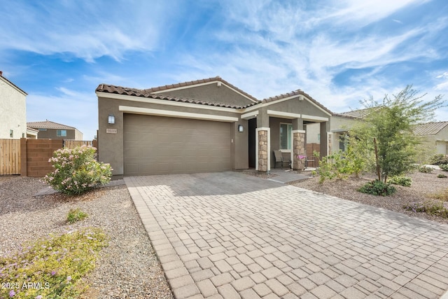 3699 E Sweetclover Ln, San Tan Valley, AZ 85140 - single story home with stucco siding, fence, an attached garage, a tiled roof, and decorative driveway