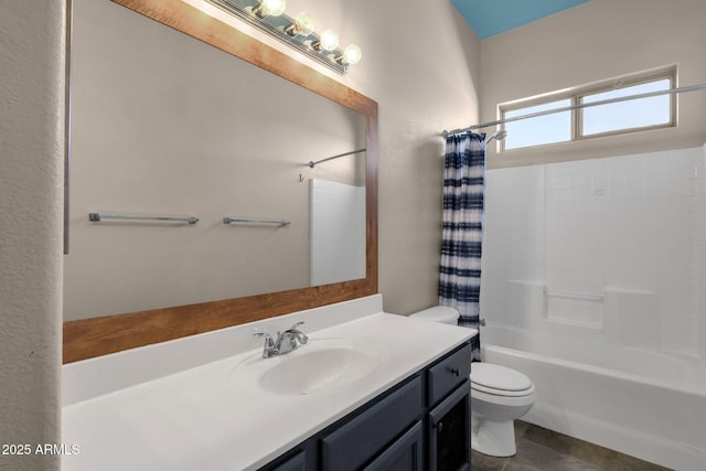 full bathroom with vanity, toilet, and shower / bath combo with shower curtain