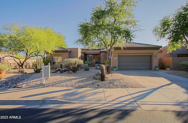 32472 N 68th Pl, Scottsdale, AZ 85266 - southwest-style home featuring stucco siding, fence, driveway, and a garage