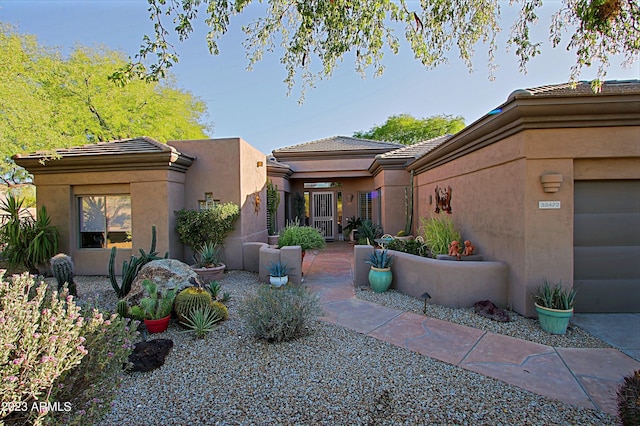 32472 N 68th Pl, Scottsdale, AZ 85266 - view of front of house featuring stucco siding and a tile roof