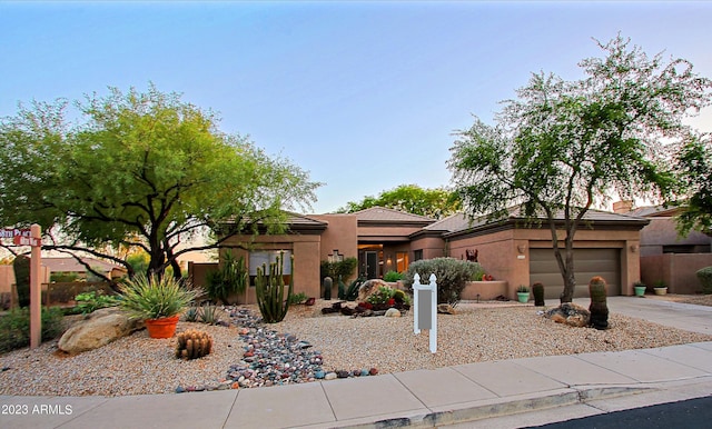 32472 N 68th Pl, Scottsdale, AZ 85266 - southwest-style home with fence, an attached garage, a tile roof, stucco siding, and driveway