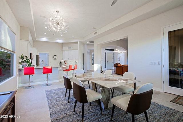 32472 N 68th Pl, Scottsdale, AZ 85266 - dining space with visible vents, tile patterned flooring, a raised ceiling, an inviting chandelier, and recessed lighting