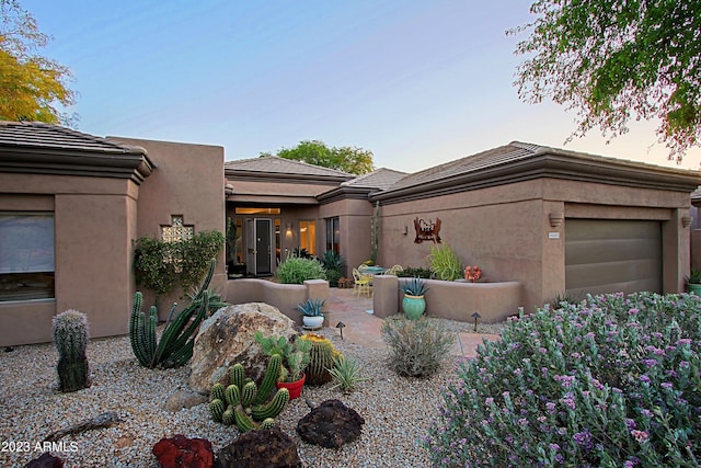 32472 N 68th Pl, Scottsdale, AZ 85266 - southwest-style home with an attached garage and stucco siding