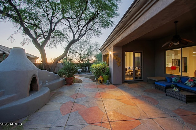 32472 N 68th Pl, Scottsdale, AZ 85266 - view of patio / terrace featuring an outdoor fireplace and a ceiling fan