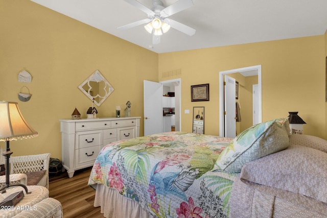 4332 E Cassia Ln, Gilbert, AZ 85298 - bedroom with vaulted ceiling, wood finished floors, and a ceiling fan