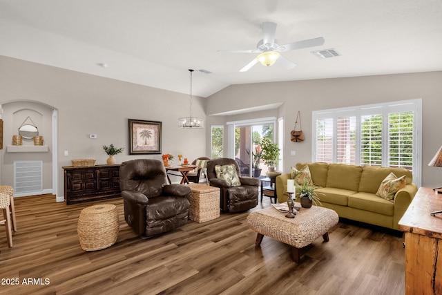 4332 E Cassia Ln, Gilbert, AZ 85298 - living room featuring wood finished floors, a ceiling fan, vaulted ceiling, and a chandelier